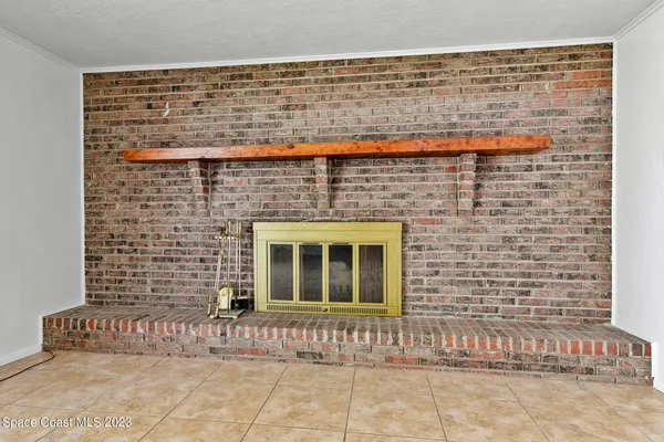 a view of an empty room with stairs
