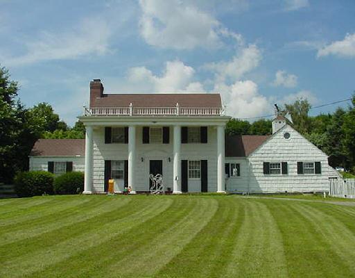 36 Clapboard Ridge Road Danbury, CT 06811 - Photo 1 of 1 a front view of a house with a yard