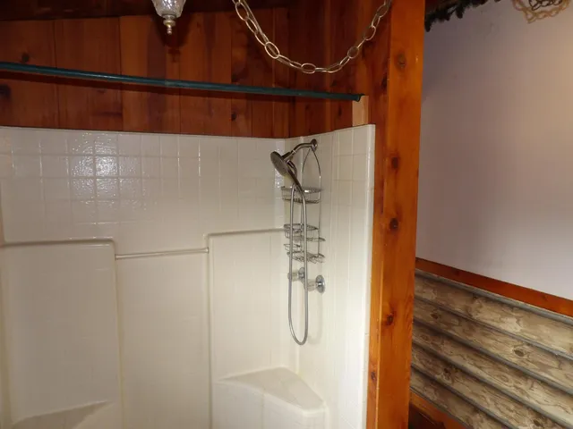 a bathroom with a sink toilet and mirror