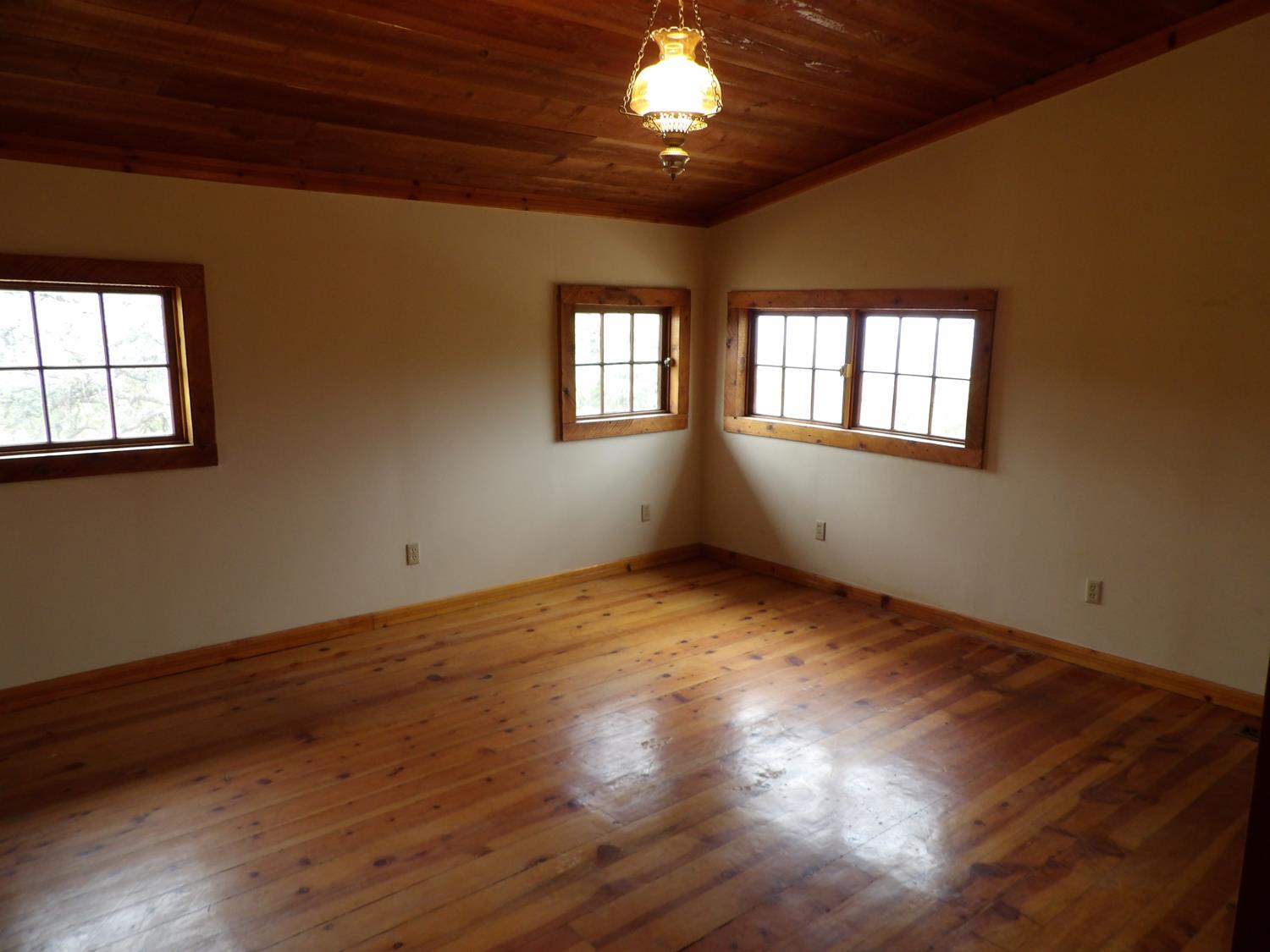 44001 Dunlap Road Miramonte, CA 93641 - Photo 27 of 91 a view of an empty room with wooden floor and a window
