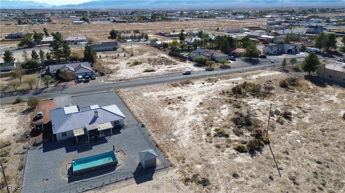 720 Intrepid Street Pahrump, NV 89048 - Photo 5 of 6 Aerial perspective of suburban area