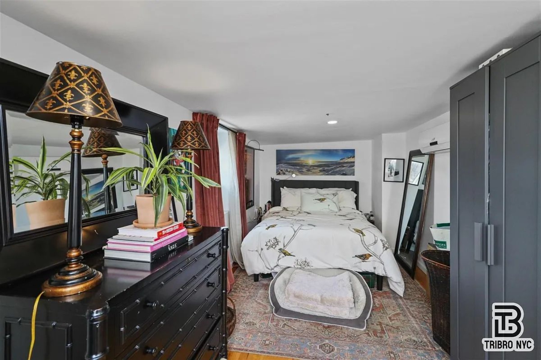 1309 Decatur Street, Unit 3C Brooklyn, NY 11207 - Photo 4 of 5 a bedroom with a bed and a flat screen tv