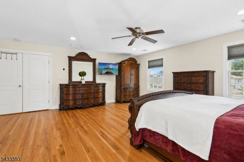 33 Stanton Street Clark, NJ 07066 - Photo 22 of 37 a spacious bedroom with a bed and a dresser