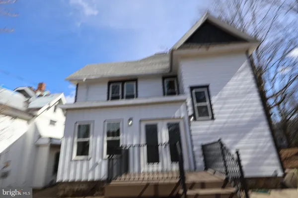 a front view of a house with a balcony