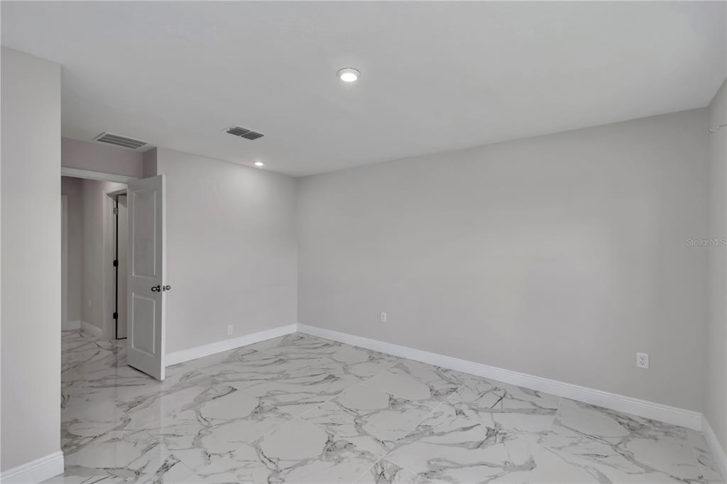 10090 Southeast 67th Terrace Belleview, FL 34420 - Photo 15 of 40 a view of an empty room