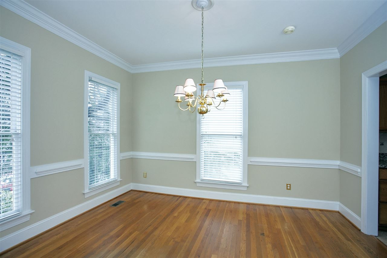 5216 Covington Bend Drive Raleigh, NC 27613 - Photo 7 of 15 The dining room is the perfect setting for enjoying meals prepared in your gourmet kitchen. Notice the extensive molding, usually found in high end, custom homes. Dining Room