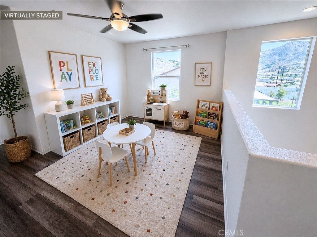 7483 Sage Scrub Road Riverside, CA 92507 - Photo 12 of 33 a living room with furniture and a wooden floor