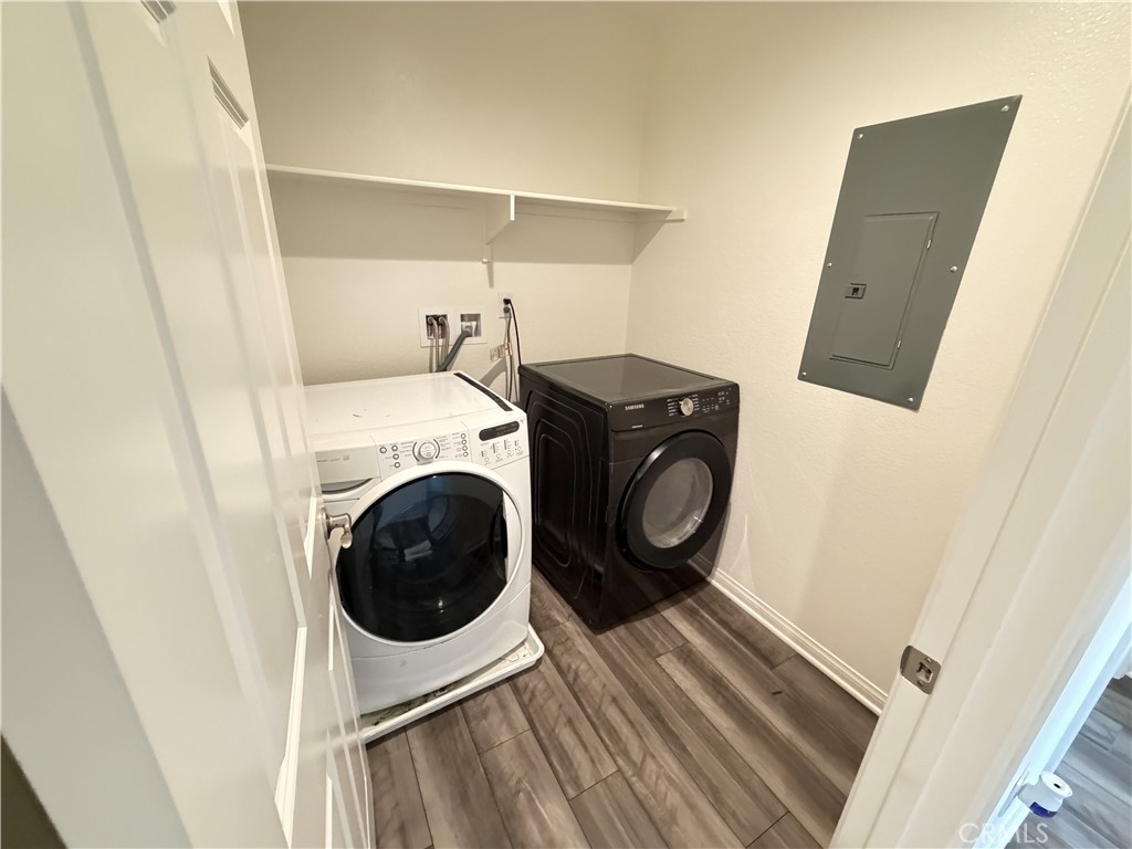 7483 Sage Scrub Road Riverside, CA 92507 - Photo 21 of 33 a utility room with dryer and washer