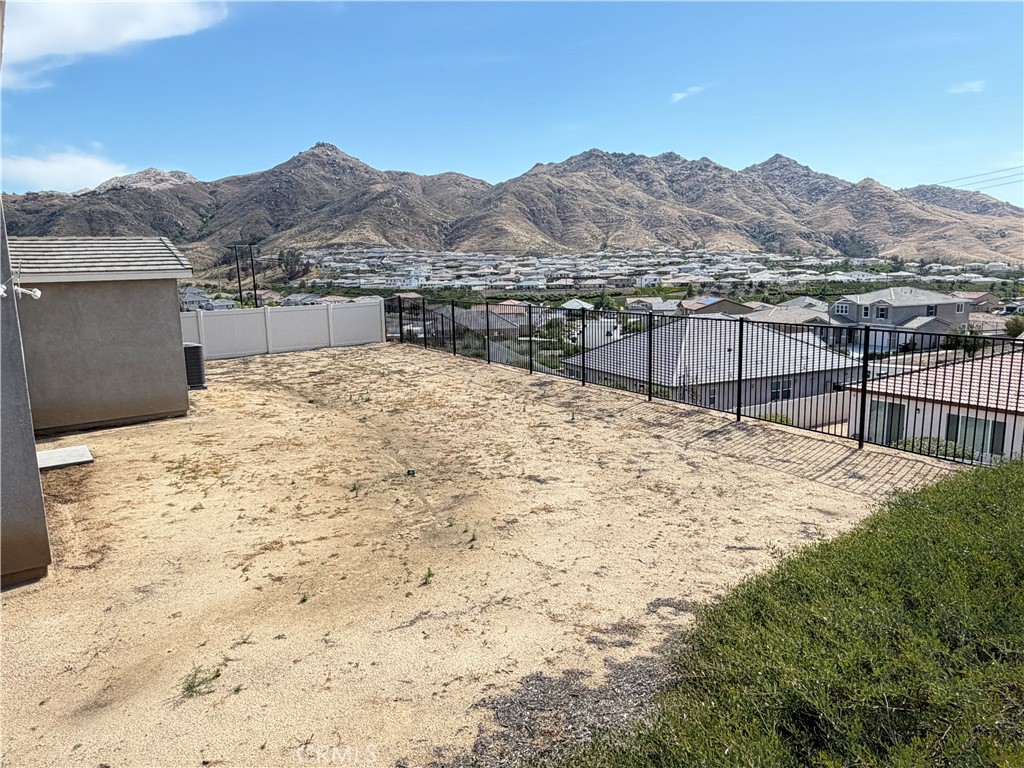 7483 Sage Scrub Road Riverside, CA 92507 - Photo 26 of 33 a view of a terrace with a mountain