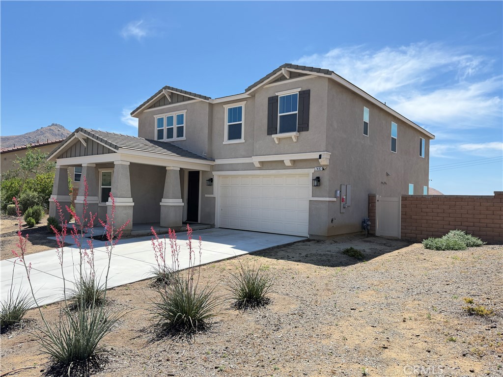 7483 Sage Scrub Road Riverside, CA 92507 - Photo 30 of 33 a front view of a house with a yard