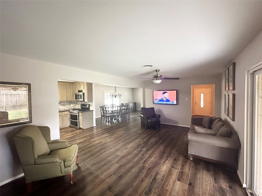 2123 Ridgecrest Drive Houston, TX 77055 - Photo 32 of 38 a living room with furniture and a flat screen tv