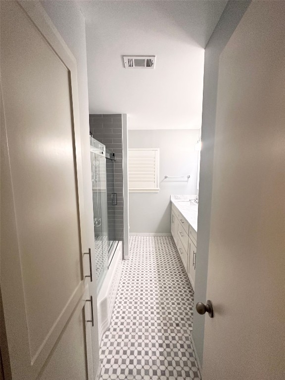 2123 Ridgecrest Drive Houston, TX 77055 - Photo 36 of 38 a bathroom with a sink and a shower