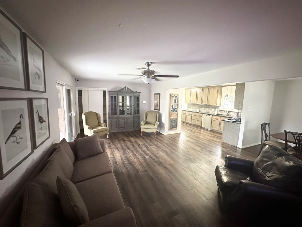 2123 Ridgecrest Drive Houston, TX 77055 - Photo 5 of 38 a living room with furniture and a wooden floor