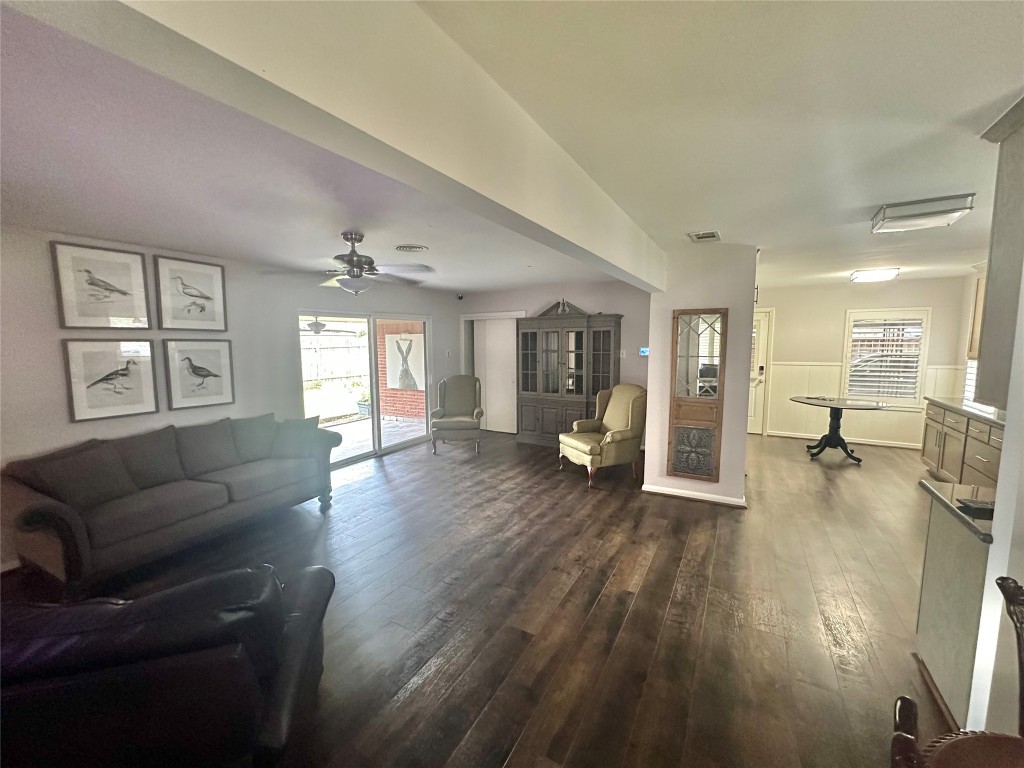 2123 Ridgecrest Drive Houston, TX 77055 - Photo 9 of 38 a living room with furniture and a wooden floor