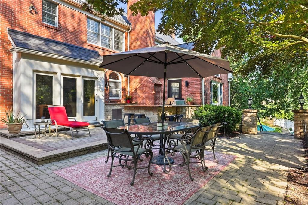 900 Settlers Ridge Road Pittsburgh, PA 15238 - Photo 39 of 50 Designed for outdoor living, the upper patio provides generous space for al fresco dining, relaxing, and gathering with family and friends.