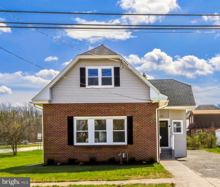 110 Washington Avenue Williamstown, NJ 08094 - Photo 1 of 32 a front view of a house with a yard