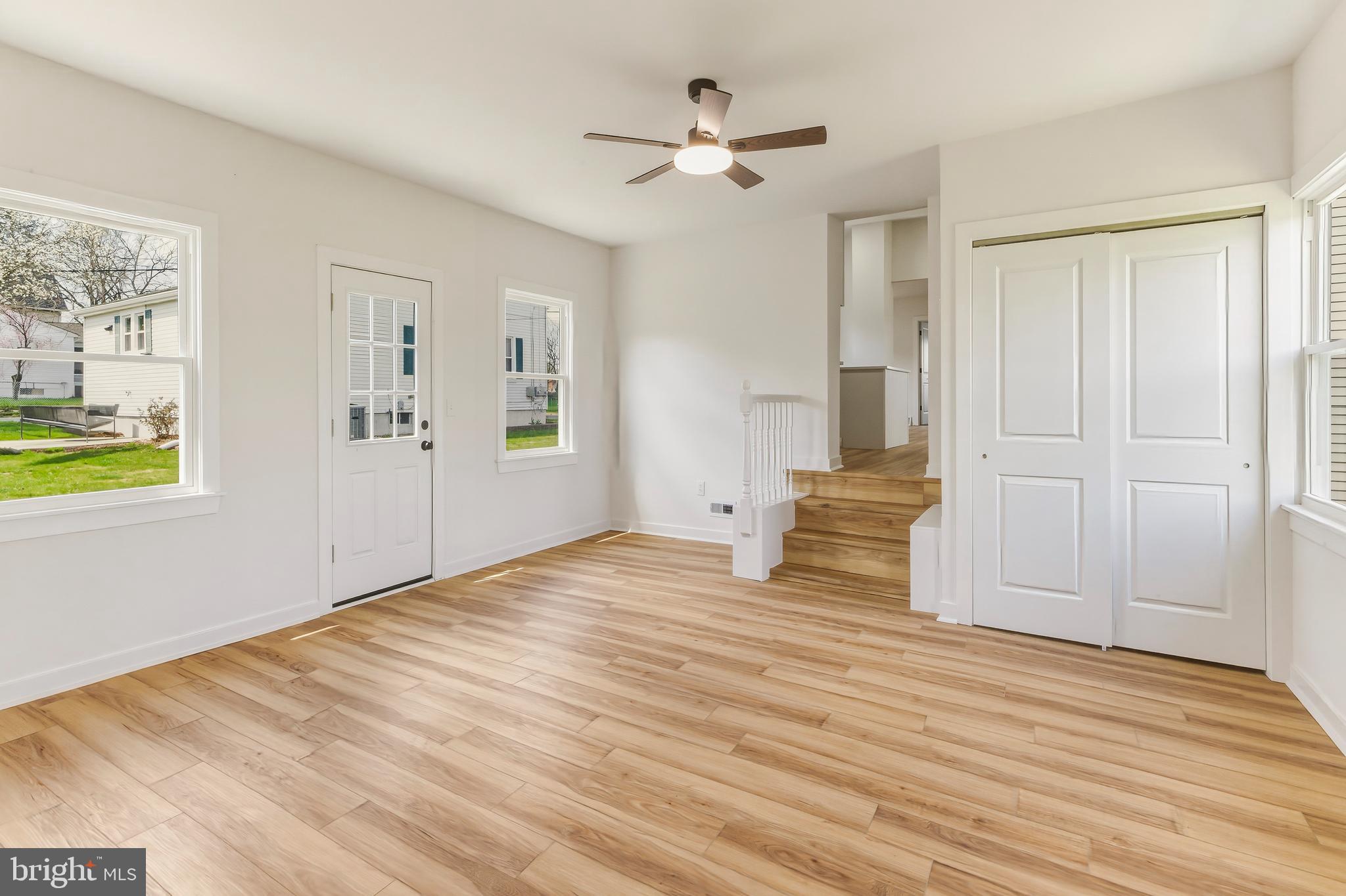 110 Washington Avenue Williamstown, NJ 08094 - Photo 19 of 32 a view of empty room with wooden floor and fan