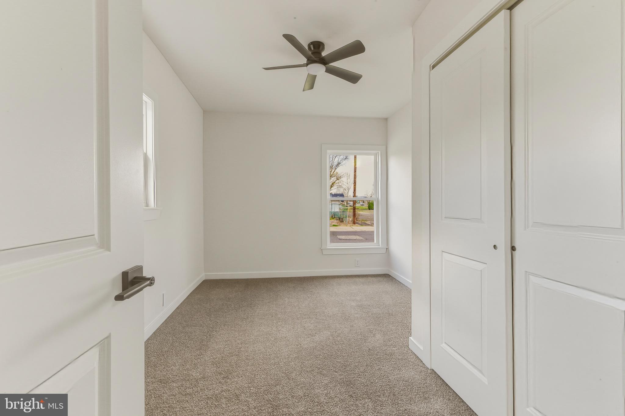 110 Washington Avenue Williamstown, NJ 08094 - Photo 25 of 32 a view of room with a ceiling fan and window