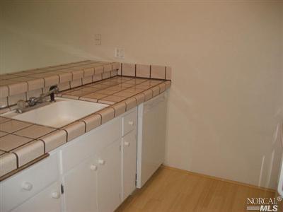 365 Eden Roc Drive Sausalito, CA 94965 - Photo 6 of 8 a utility room with dryer and washer