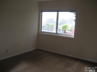 365 Eden Roc Drive Sausalito, CA 94965 - Photo 8 of 8 an empty room with a window