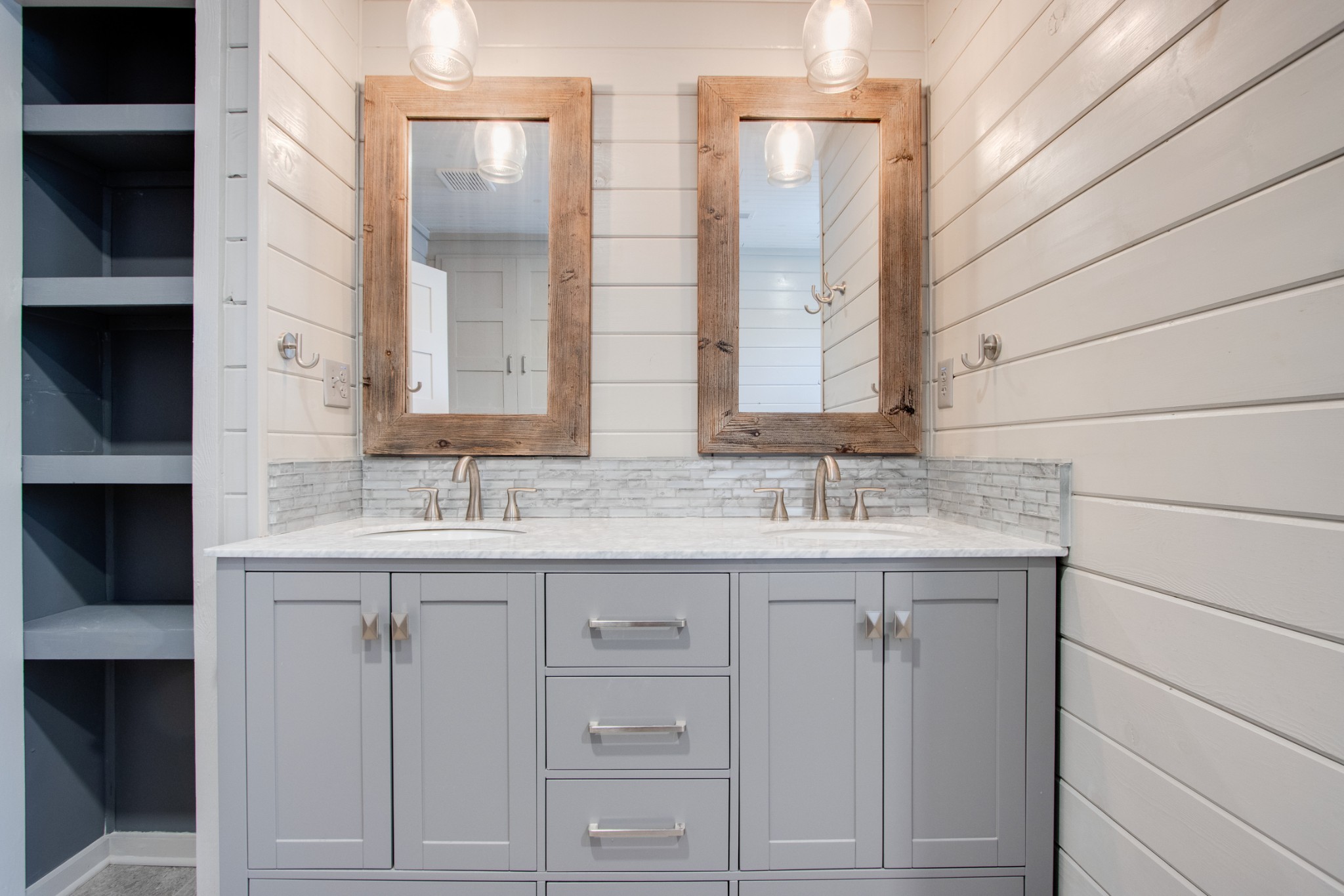 274 Hiwassee Road Lebanon, TN 37087 - Photo 20 of 44 a bathroom with double sink and a mirror