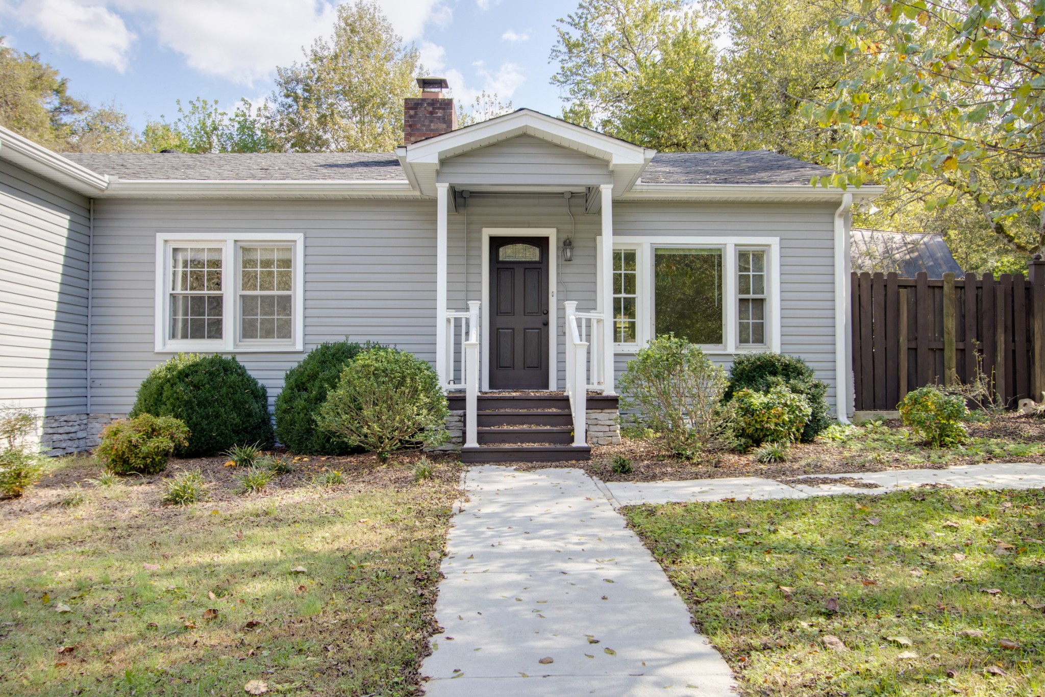 274 Hiwassee Road Lebanon, TN 37087 - Photo 3 of 44 a front view of a house with garden