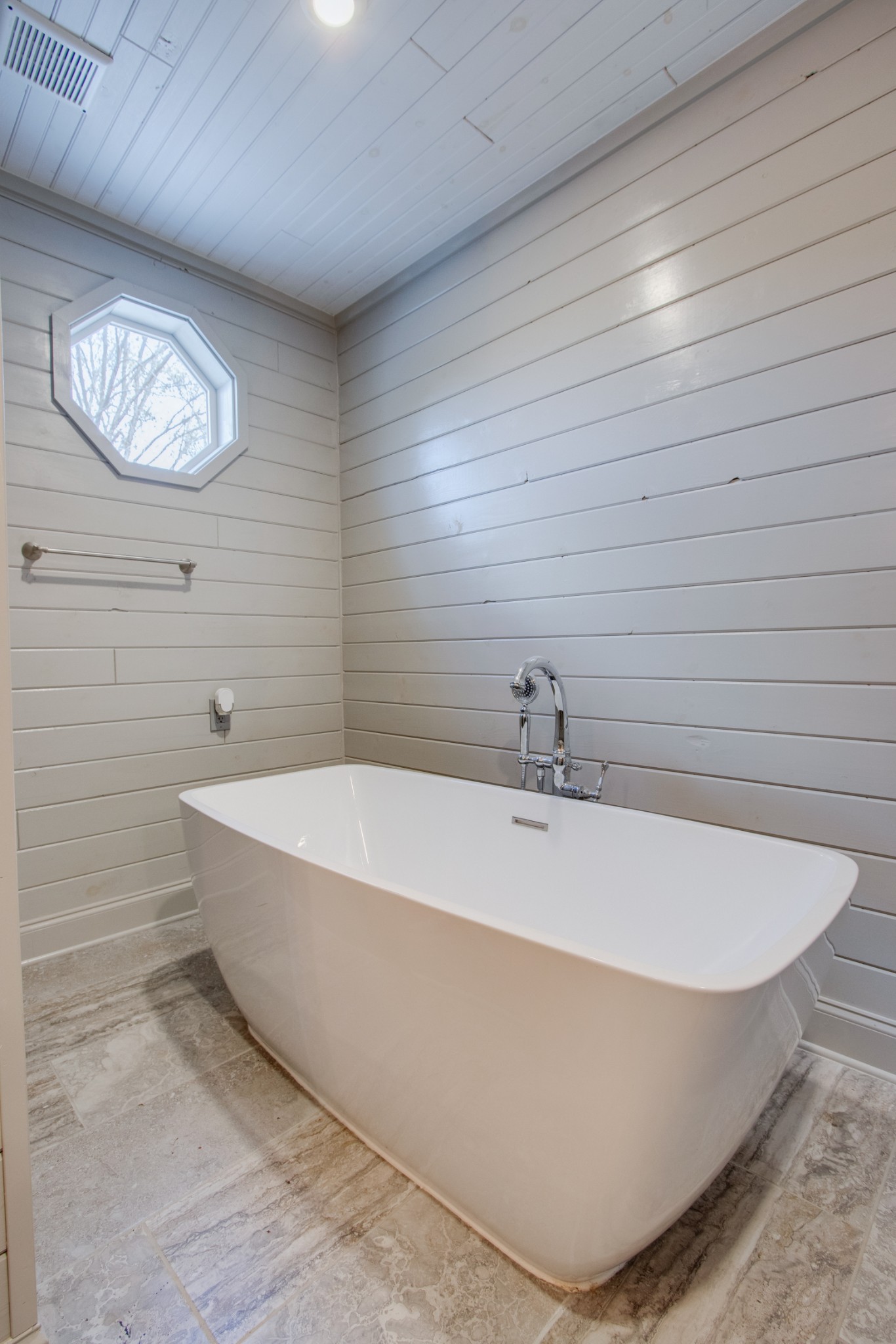 274 Hiwassee Road Lebanon, TN 37087 - Photo 21 of 44 a white bath tub sitting in a bathroom