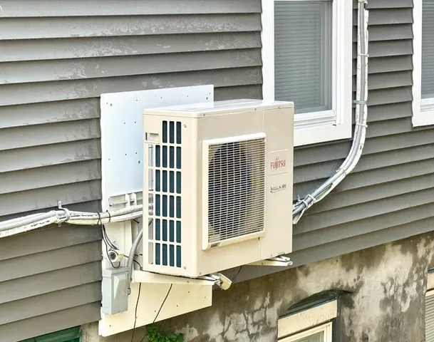 a view of a house with a large window