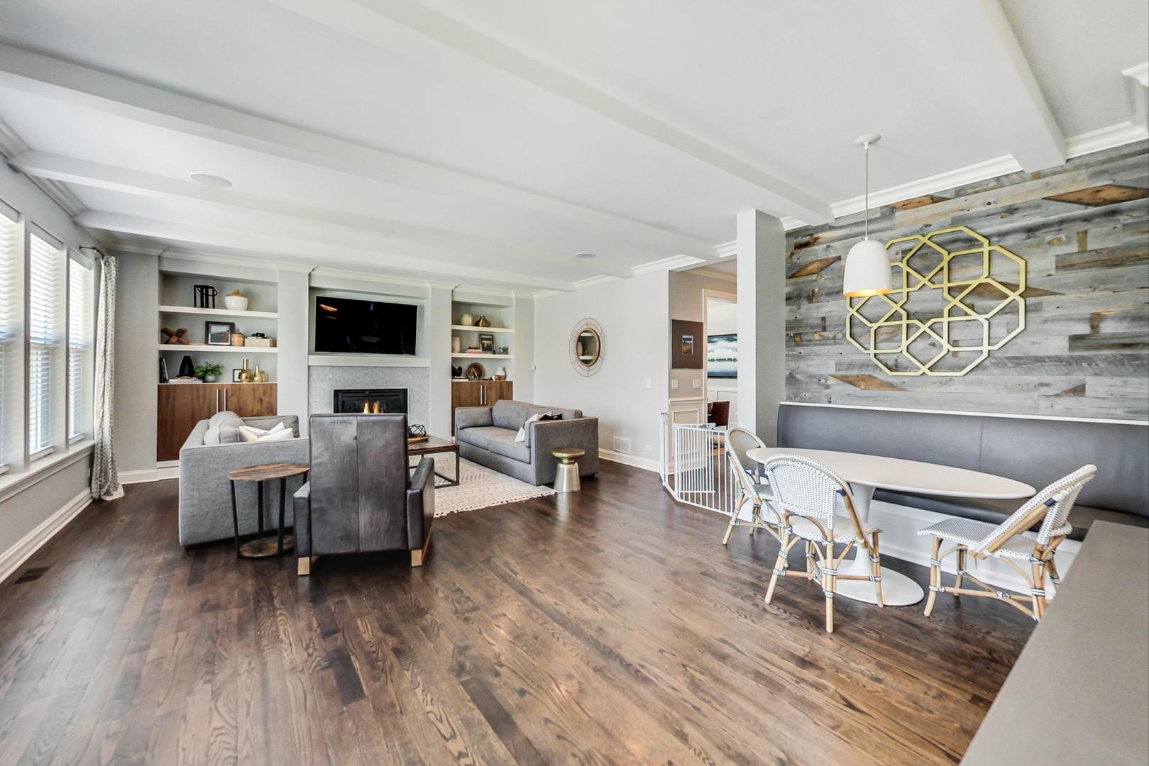 219 Clinton Avenue Elmhurst, IL 60126 - Photo 11 of 49 a living room with furniture and wooden floor