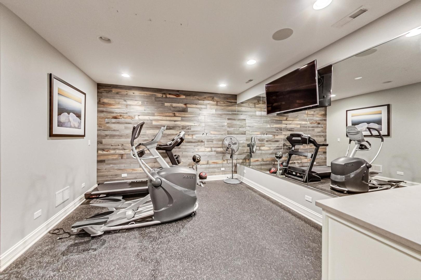 219 Clinton Avenue Elmhurst, IL 60126 - Photo 39 of 49 a view of a room with gym equipment