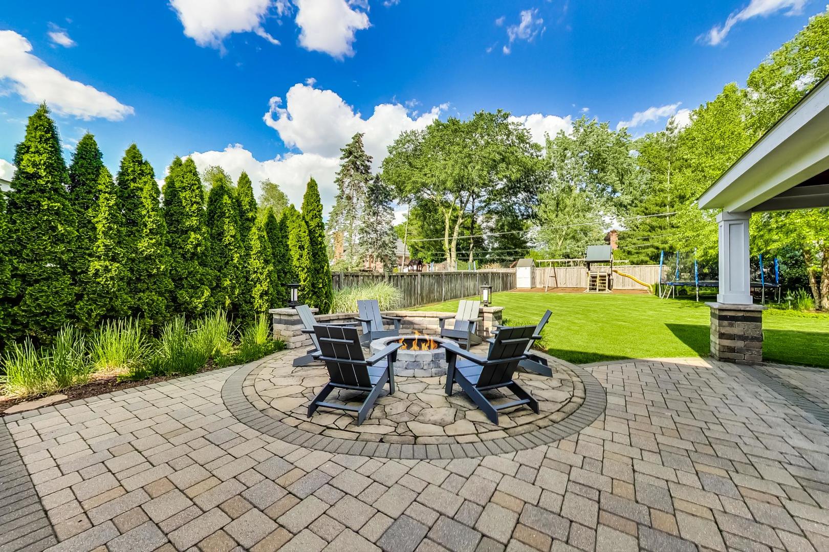 219 Clinton Avenue Elmhurst, IL 60126 - Photo 44 of 49 a view of a house with backyard porch and sitting area