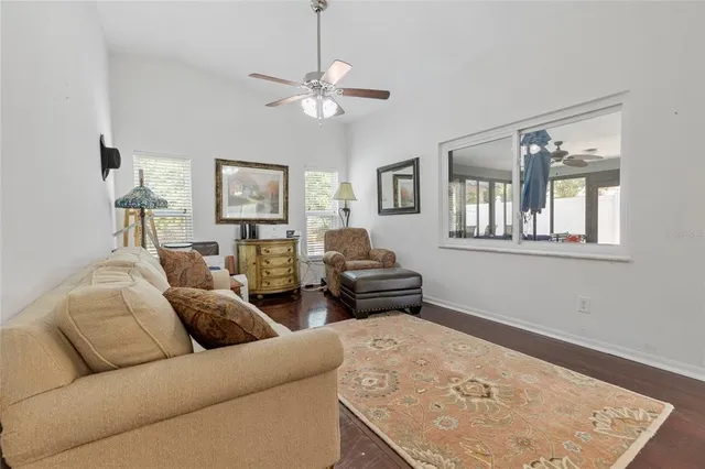 a living room with furniture and a window