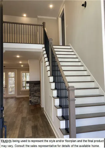 a bathroom with a sink a mirror and shower