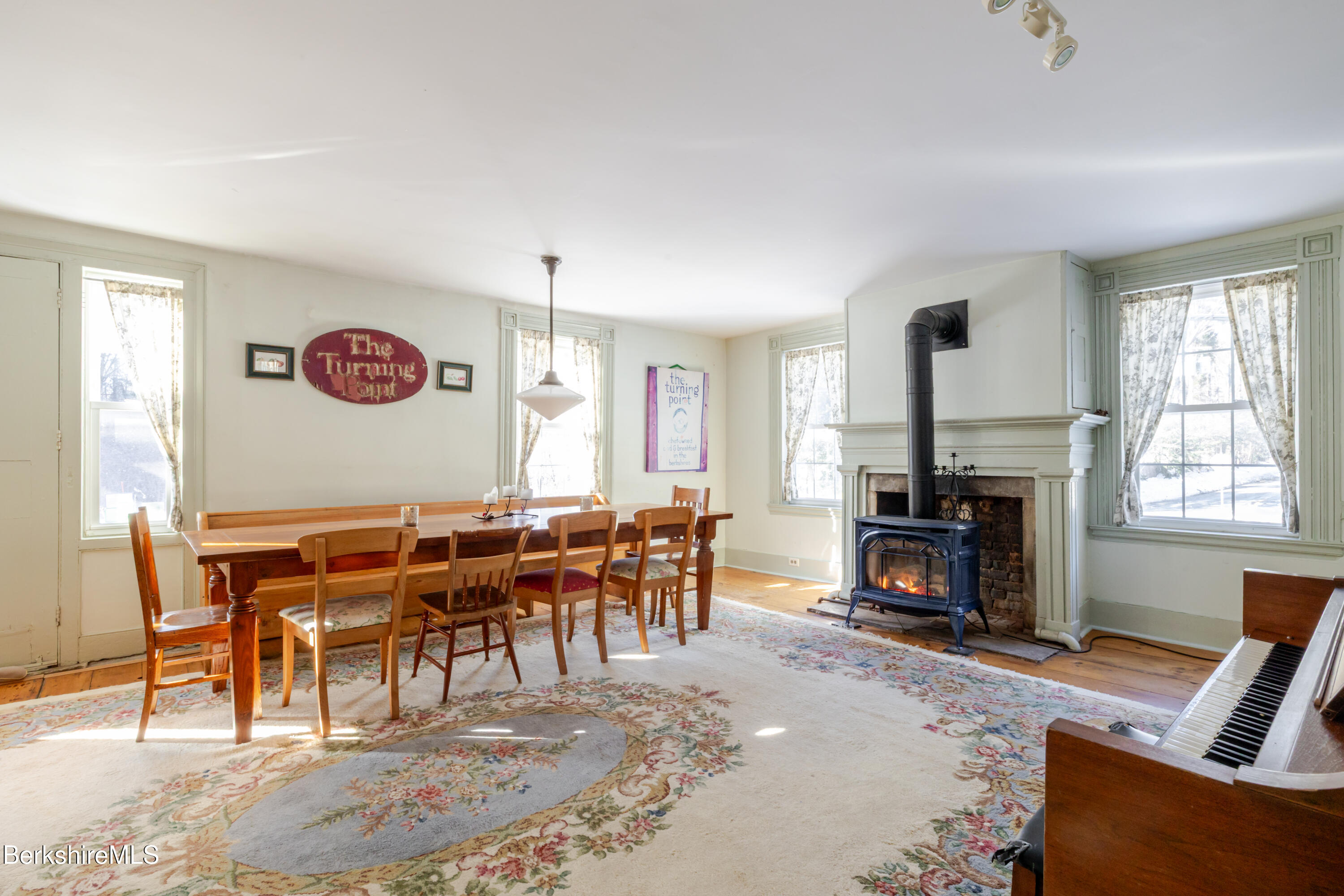 3 Lake Buel Road Great Barrington, MA 01230 - Photo 12 of 55 a view of a livingroom with furniture and a fireplace
