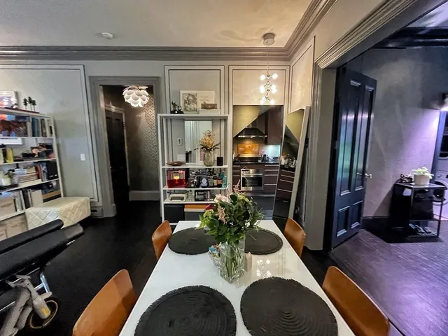 a room with furniture and wooden floor