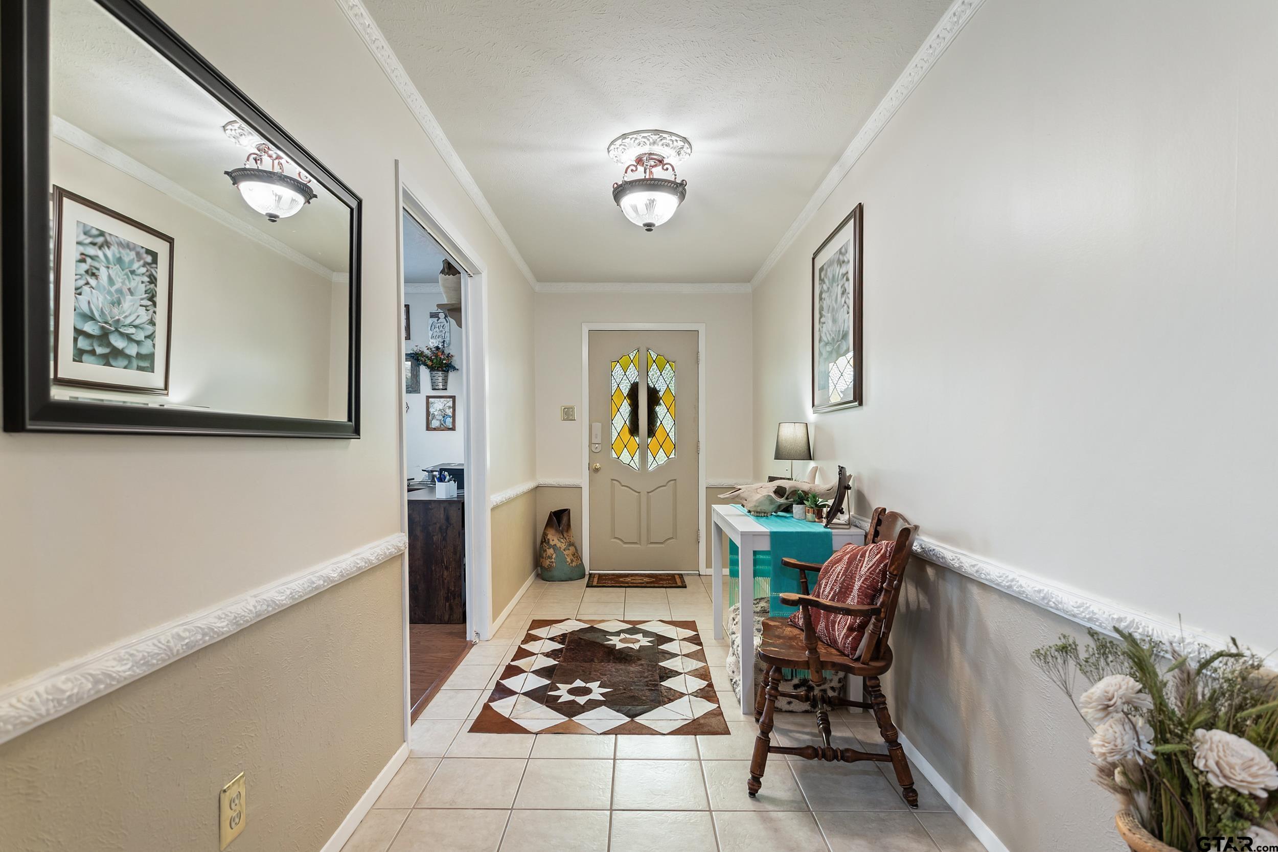 516 Ruthlynn Drive Longview, TX 75605 - Photo 3 of 34 a living room with furniture and a table