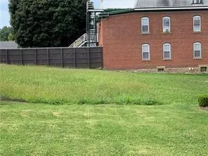 a view of front of a house with a yard
