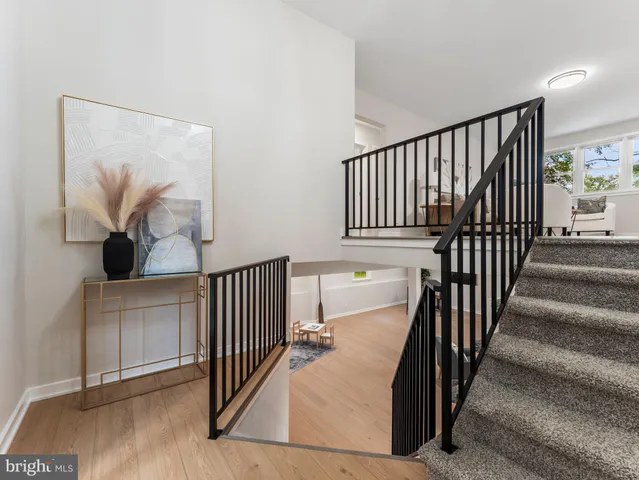 a view of entryway with wooden floor