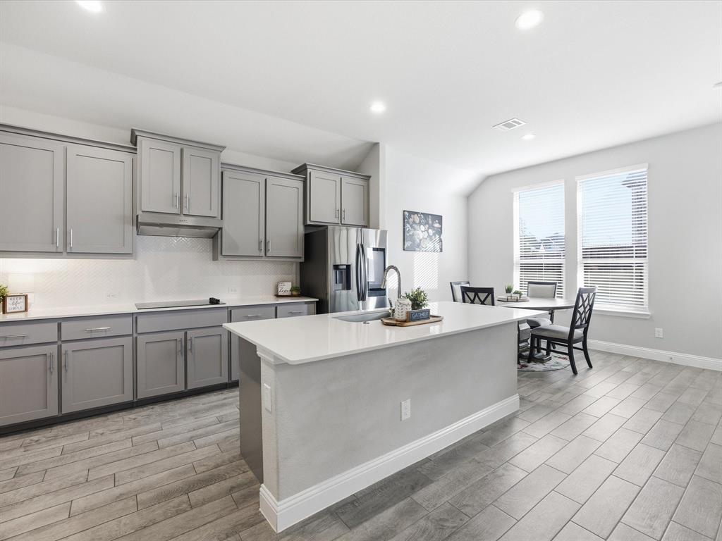 1006 Fairhaven Drive Midlothian, TX 76065 - Photo 40 of 40 Spacious open floorplan kitchen with island and walk-in pantry