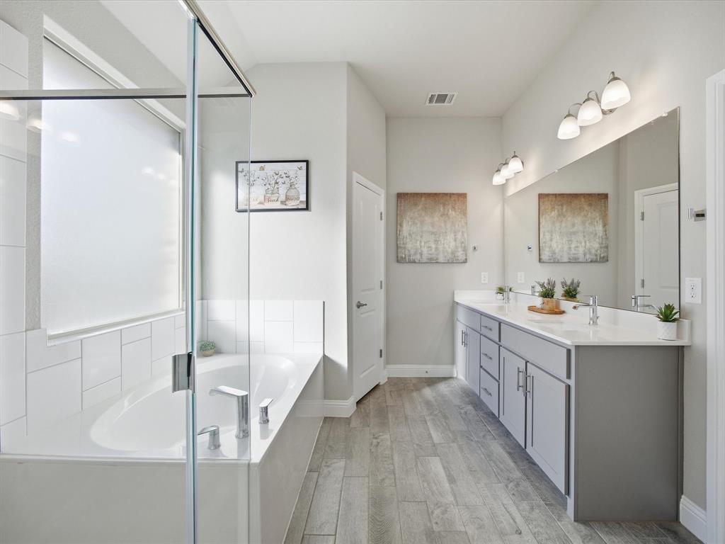 1006 Fairhaven Drive Midlothian, TX 76065 - Photo 11 of 40 Primary bathroom with walk-in closet, large tub and linen closet