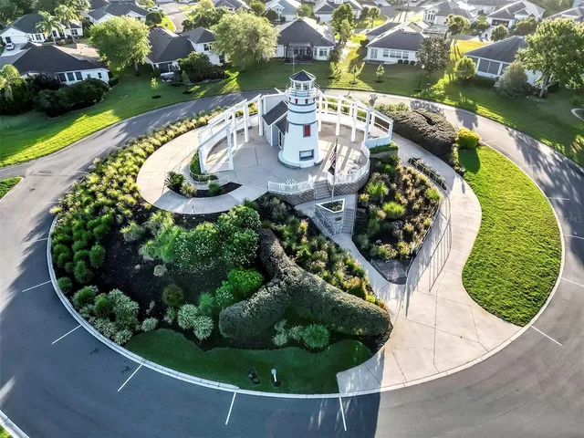 an aerial view of a swimming pool and outdoor space
