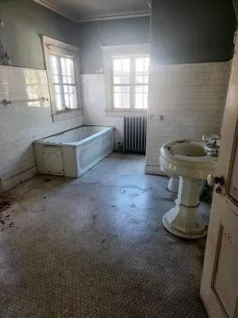 a bathroom with a sink and a toilet