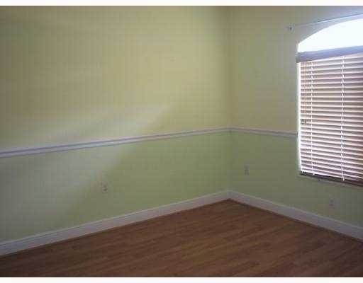 17241 Southwest 285th Street Homestead, FL 33030 - Photo 12 of 14 an empty room with a window