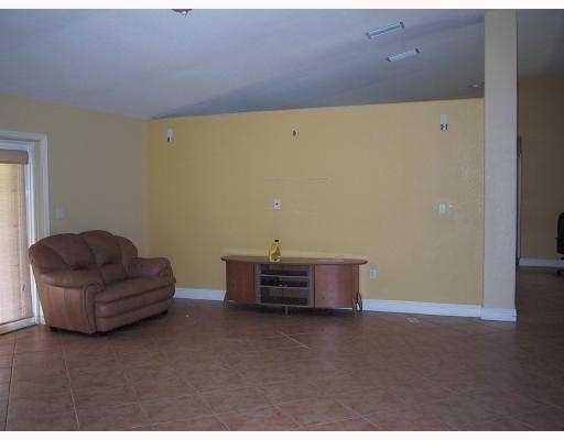 17241 Southwest 285th Street Homestead, FL 33030 - Photo 3 of 14 a view of workspace with furniture
