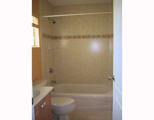 17241 Southwest 285th Street Homestead, FL 33030 - Photo 9 of 14 a bathroom with a shower a toilet and a sink