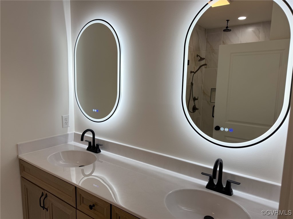 745 Robertsons Road Blackstone, VA 23824 - Photo 17 of 42 Full bathroom with double vanity, a sink, and walk