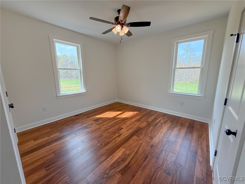 745 Robertsons Road Blackstone, VA 23824 - Photo 21 of 42 Empty room with baseboards, ceiling fan, visible v