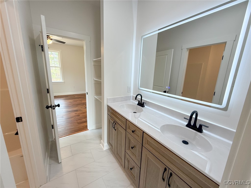 745 Robertsons Road Blackstone, VA 23824 - Photo 25 of 42 Bathroom featuring marble finish floor, a sink, do