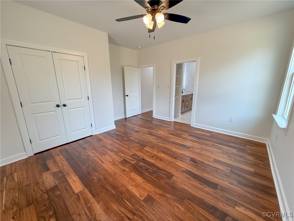 745 Robertsons Road Blackstone, VA 23824 - Photo 29 of 42 Unfurnished bedroom featuring baseboards, a closet