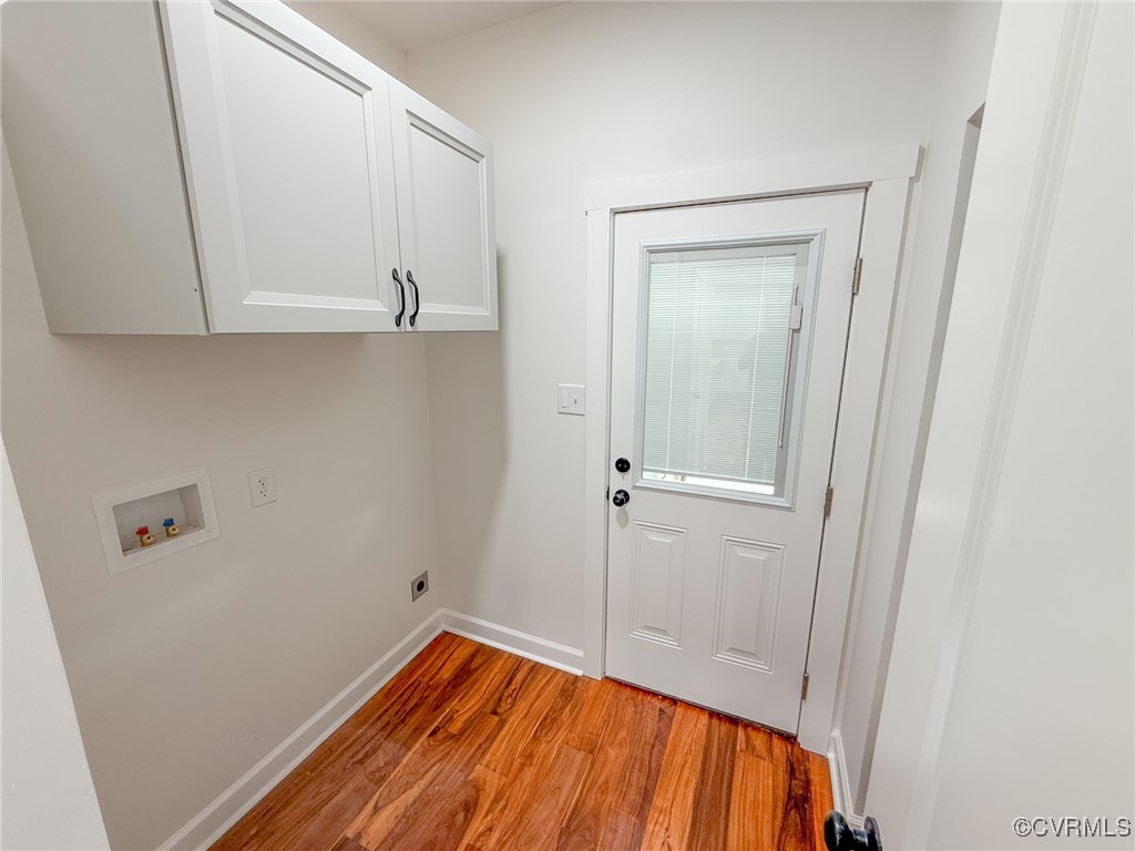 745 Robertsons Road Blackstone, VA 23824 - Photo 32 of 42 Laundry room featuring washer hookup, baseboards,